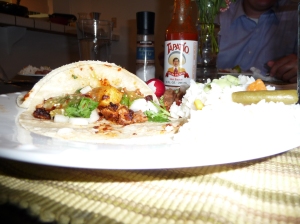 Side view of my amazing tacos.  I don't know how that Tapatio got into the shot, it was totally unecessary with the three homemade salsas I churned out!